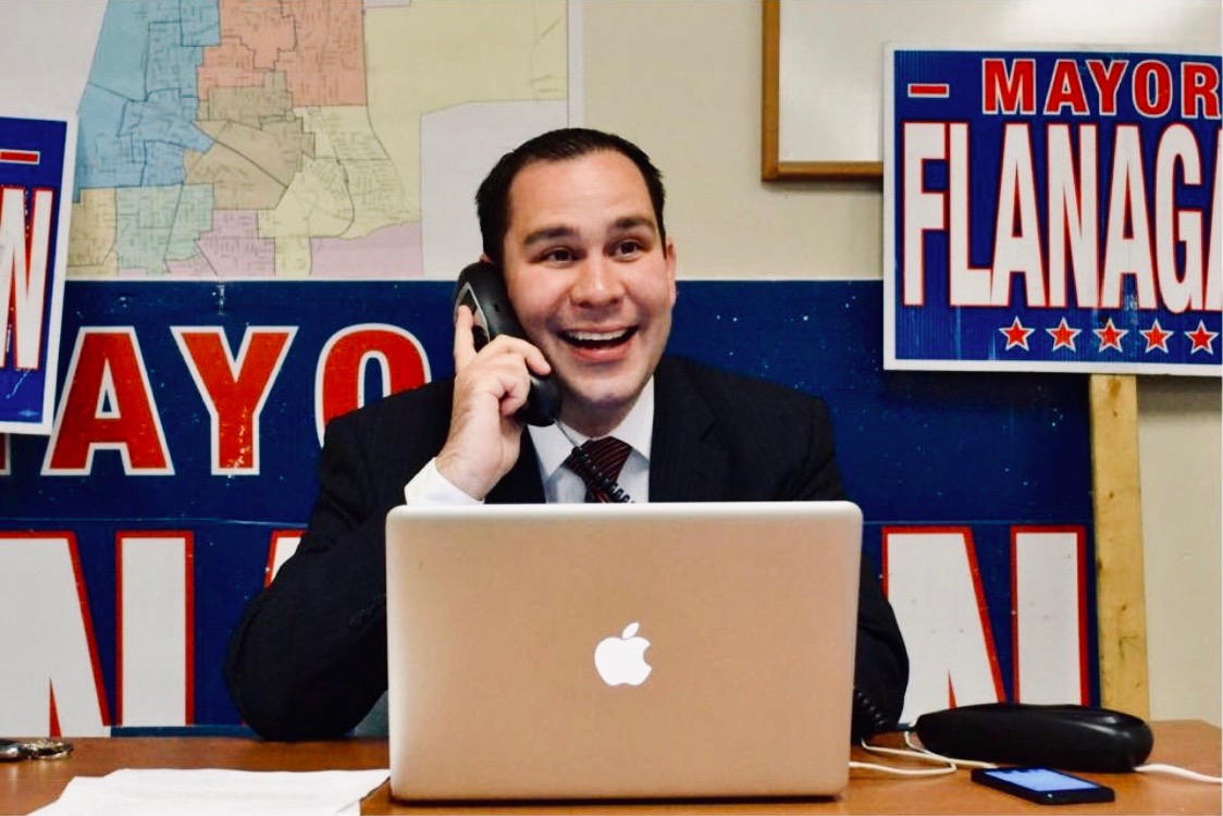 Will Flanagan at the campaign headquarters on the phone with a supporter