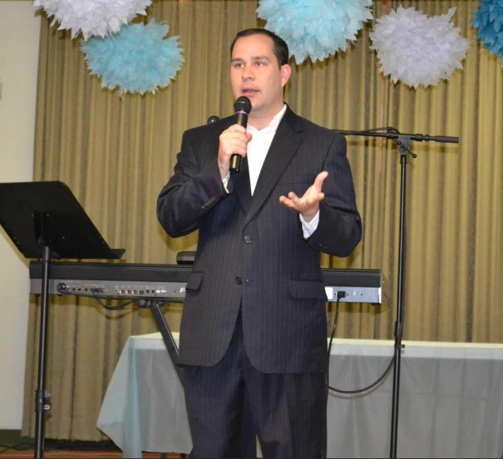 Will Flanagan speaking at a Fall River community event